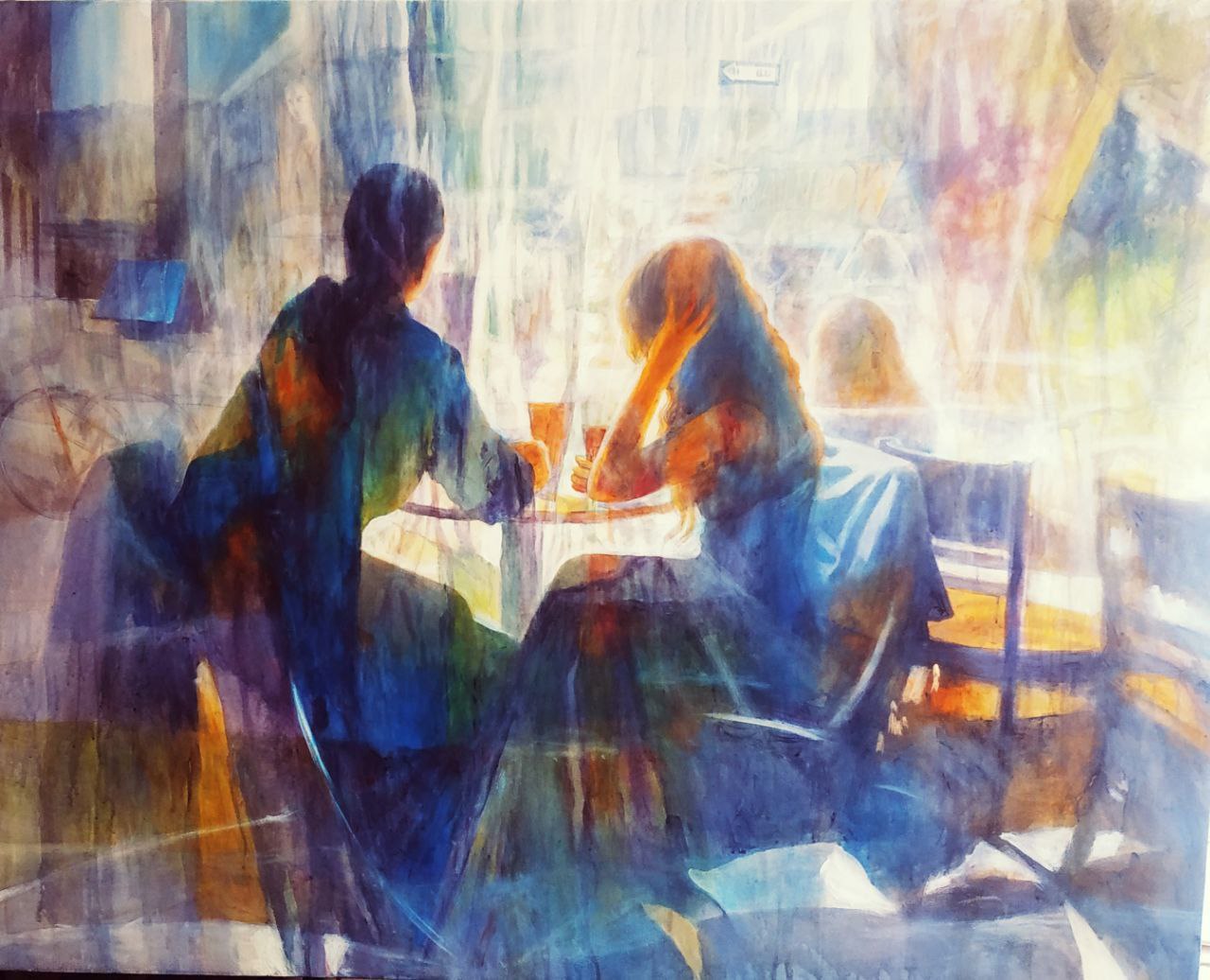Two people in a cafe.